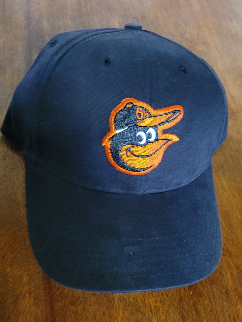 Navy Baseball Cap with Orange Bird Logo